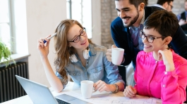 coworking-colleagues-having-conversation-at-workplace-1