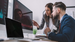 selective-focus-of-information-security-analysts-using-charts-on-computer-monitors-while-working-in-1024x684